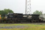 NS 8413, in the rain, headed west on train 135